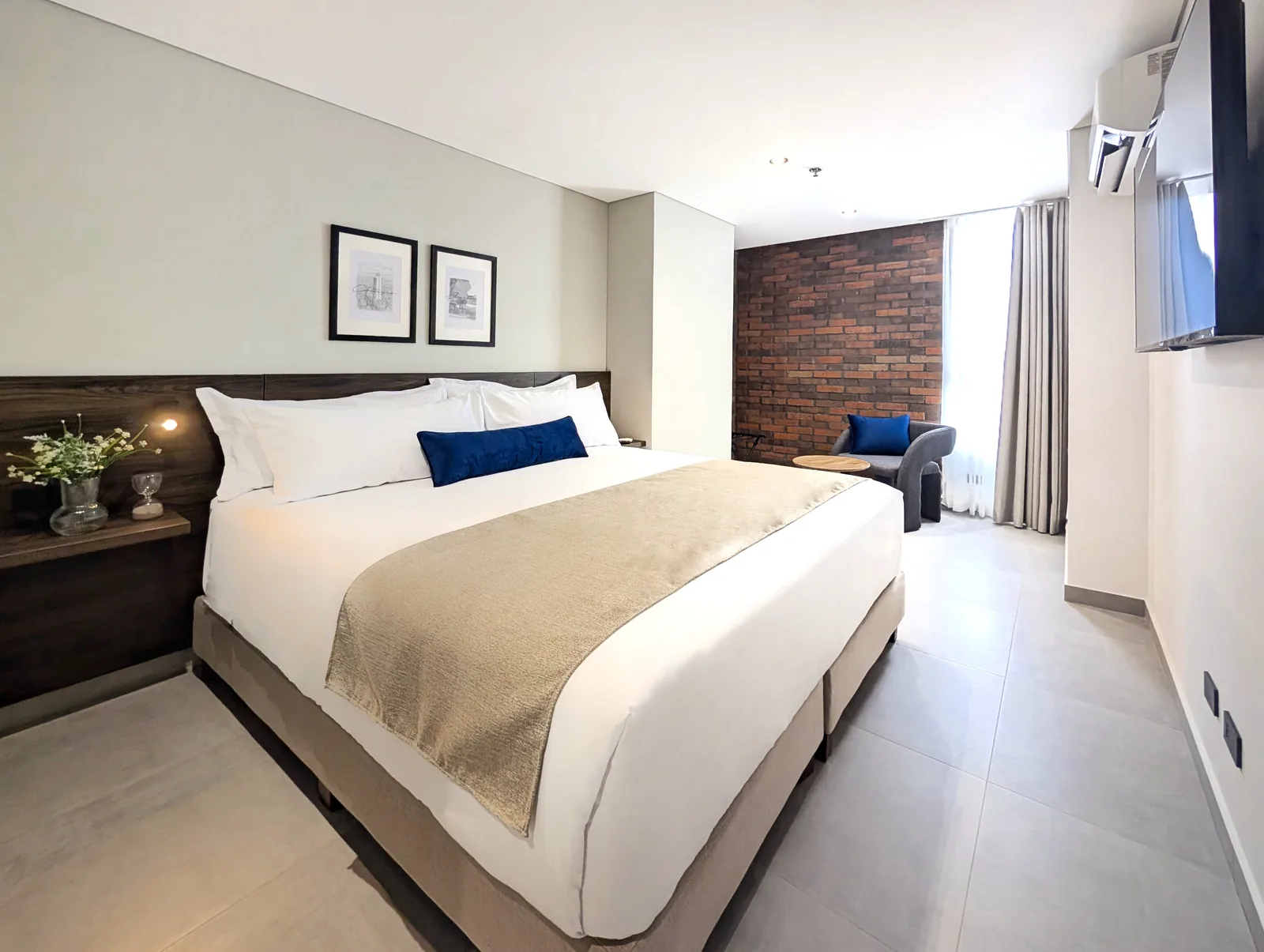 Suite Family con dos dormitorios, sala-comedor y cocina completa en Laureles Selection Suites